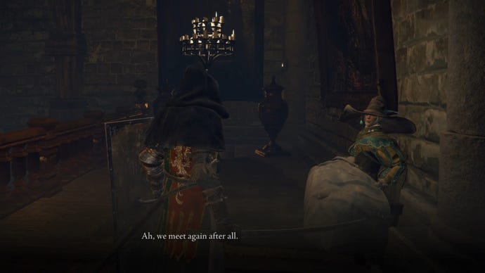 The player in Elden Ring speaks to Sorcerer Rogier, who sits on the balcony of the Roundtable Hold.