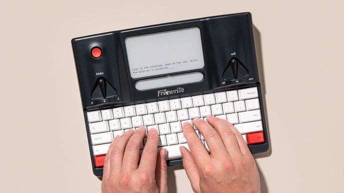 A Freewrite Smart Typewriter, being typed upon.