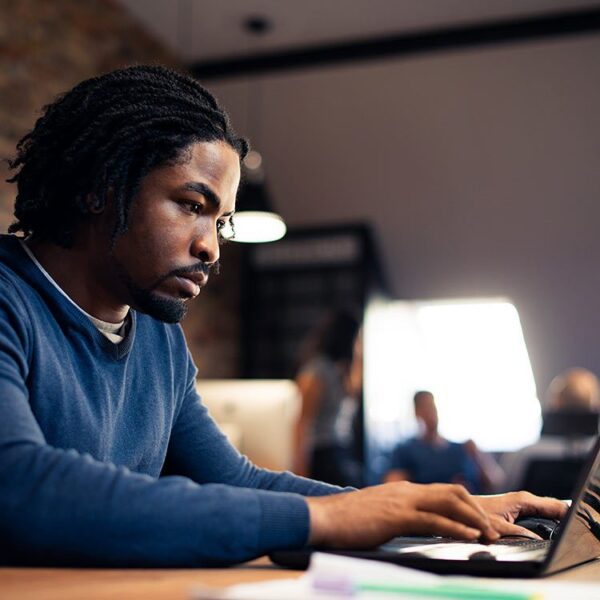 Man working on his laptop.