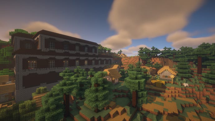 Minecraft screenshot of the 'sunken mansion' seed showing a Woodlands Mansion surrounded by a forest and village.