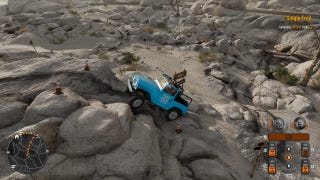 An off-road vehicle tries to reach the top of some rocks in Pure Rock Crawling.